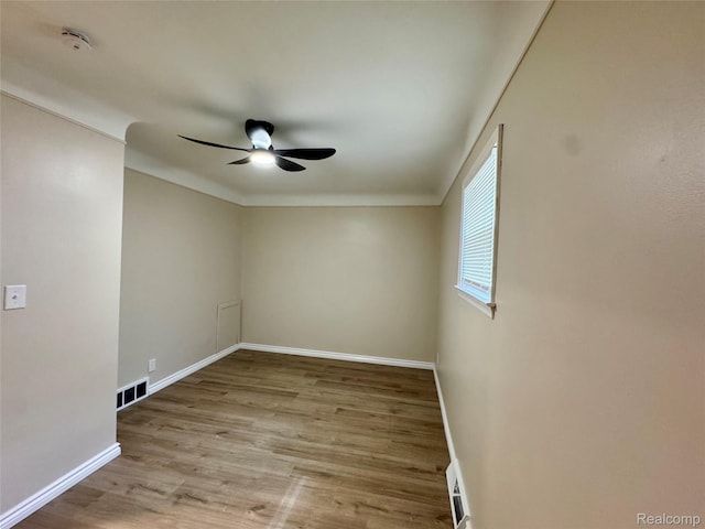 14276 Hobart Ave, Warren, MI 48089 - empty room with a ceiling fan, wood finished floors, and a smoke detector