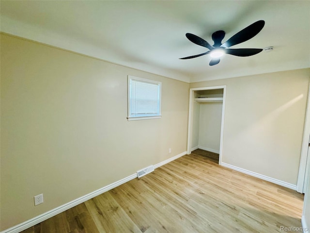 14276 Hobart Ave, Warren, MI 48089 - unfurnished bedroom featuring wood finished floors, a closet, and a ceiling fan