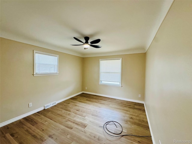 14276 Hobart Ave, Warren, MI 48089 - unfurnished room with healthy amount of natural light, wood finished floors, and ceiling fan