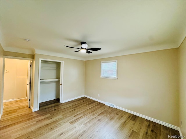 14276 Hobart Ave, Warren, MI 48089 - unfurnished bedroom featuring a closet, light wood-style flooring, and ceiling fan