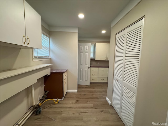14276 Hobart Ave, Warren, MI 48089 - washroom with light wood-style flooring and recessed lighting