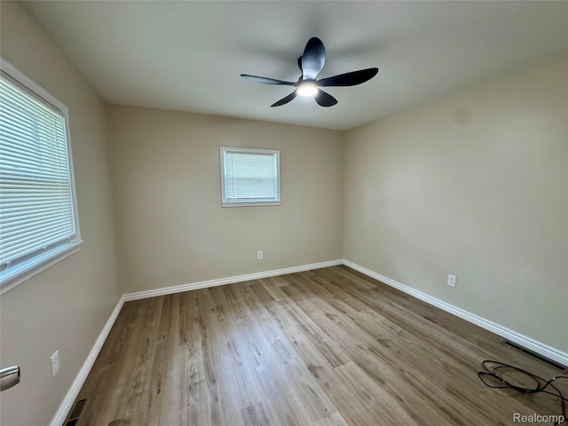 14276 Hobart Ave, Warren, MI 48089 - spare room with wood finished floors and ceiling fan