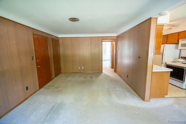 3400 Elizabeth Dr Unit 4, Trenton, MI 48183 - corridor featuring wood walls and light colored carpet