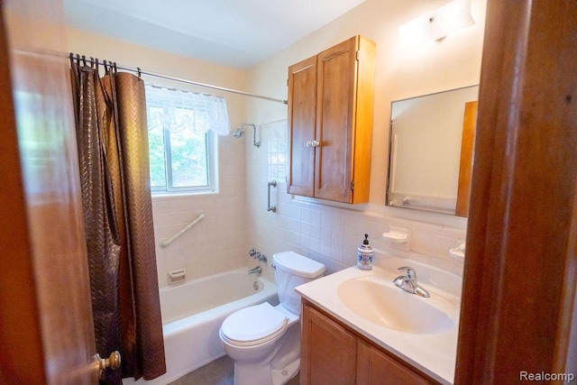 3400 Elizabeth Dr Unit 4, Trenton, MI 48183 - full bath featuring shower / bath combo with shower curtain, vanity, tile walls, and decorative backsplash