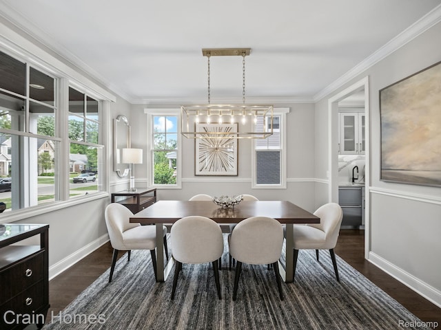 1790 Washington Blvd, Birmingham, MI 48009 - dining space featuring a chandelier, dark wood-style flooring, and ornamental molding