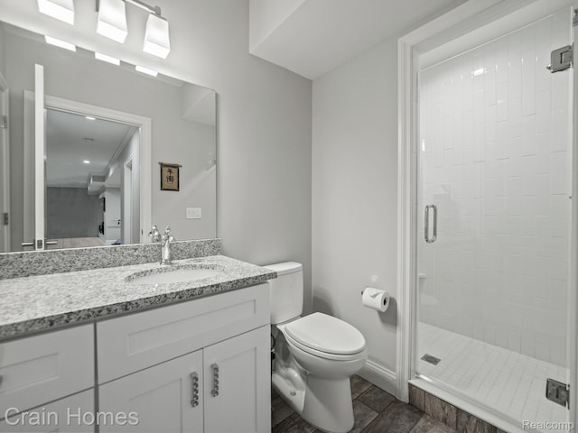 1790 Washington Blvd, Birmingham, MI 48009 - bathroom with a stall shower, vanity, and wood finished floors