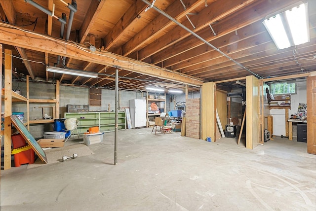 4301B W Sanborn Rd, Lake City, MI 49651 - basement featuring freestanding refrigerator
