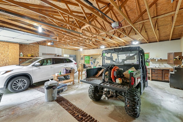 4301B W Sanborn Rd, Lake City, MI 49651 - garage featuring a garage door opener