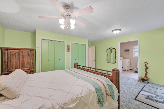 4301B W Sanborn Rd, Lake City, MI 49651 - bedroom featuring independent washer and dryer, multiple closets, a textured ceiling, and a ceiling fan