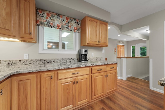 4301B W Sanborn Rd, Lake City, MI 49651 - kitchen featuring wood finished floors, light stone counters, and recessed lighting