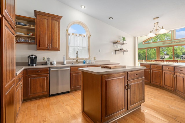 27418 Orchard Dr, Sturgis, MI 49091 - kitchen featuring stainless steel dishwasher, open shelves, lofted ceiling, a kitchen island, and light wood finished floors