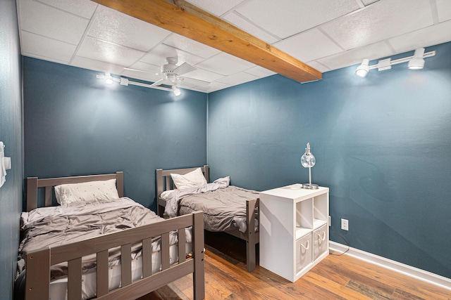 27418 Orchard Dr, Sturgis, MI 49091 - bedroom featuring wood finished floors, a paneled ceiling, and ceiling fan