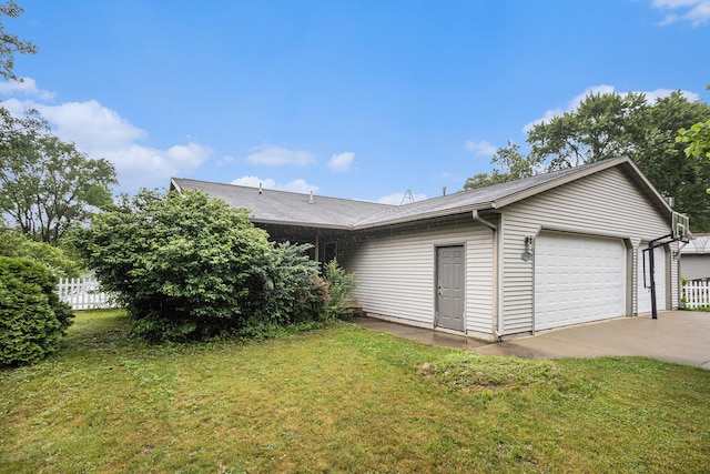 27418 Orchard Dr, Sturgis, MI 49091 - view of side of home featuring roof with shingles and a garage
