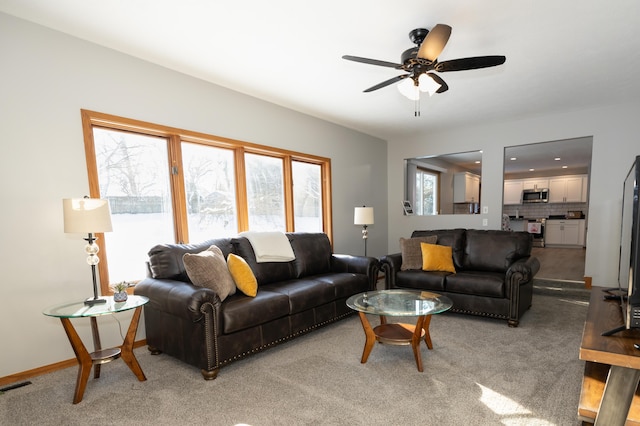 5825 Saddle Club Dr, Kalamazoo, MI 49009 - living area with light carpet and a ceiling fan
