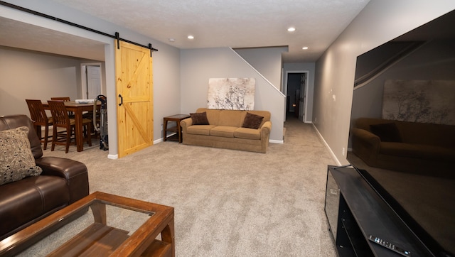5825 Saddle Club Dr, Kalamazoo, MI 49009 - living room with a barn door, carpet floors, and recessed lighting