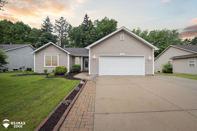 11419 Autumn Breeze Trl, Clio, MI 48420 - ranch-style house with a front lawn, concrete driveway, and an attached garage