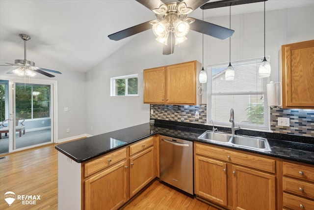 11419 Autumn Breeze Trl, Clio, MI 48420 - kitchen featuring dishwasher, ceiling fan, lofted ceiling, a peninsula, and tasteful backsplash