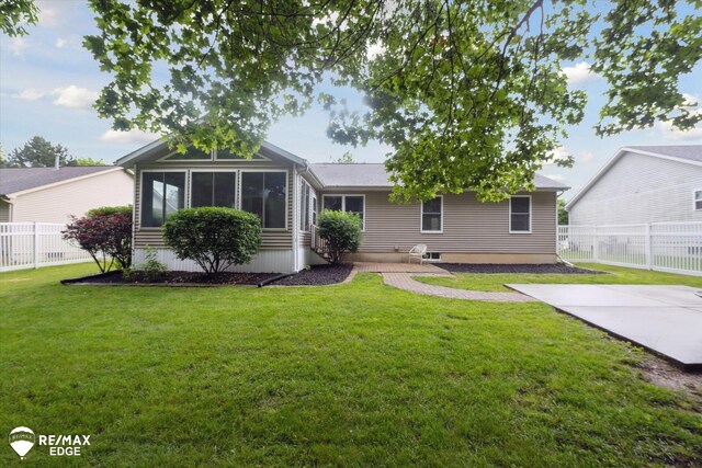 11419 Autumn Breeze Trl, Clio, MI 48420 - rear view of house featuring a sunroom and a patio area