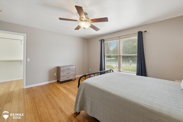 11419 Autumn Breeze Trl, Clio, MI 48420 - bedroom featuring light wood-style floors and a ceiling fan