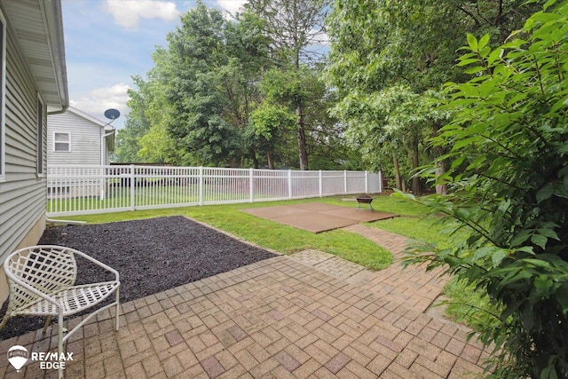 11419 Autumn Breeze Trl, Clio, MI 48420 - fenced backyard featuring a patio area