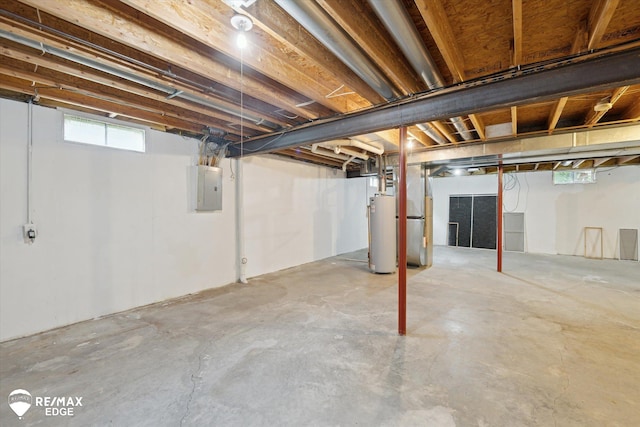 11419 Autumn Breeze Trl, Clio, MI 48420 - below grade area featuring electric panel, gas water heater, and heating unit