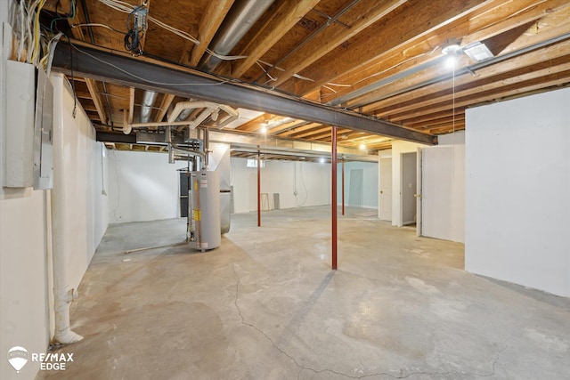 11419 Autumn Breeze Trl, Clio, MI 48420 - unfinished below grade area featuring gas water heater and electric panel