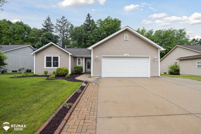 11419 Autumn Breeze Trl, Clio, MI 48420 - ranch-style house with a front yard, an attached garage, and driveway