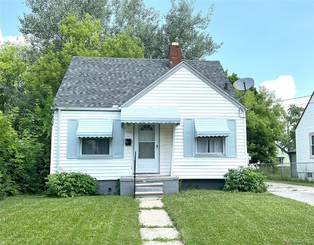 182 Crystal Lake Dr, Pontiac, MI 48341 - bungalow-style home featuring a shingled roof and a chimney