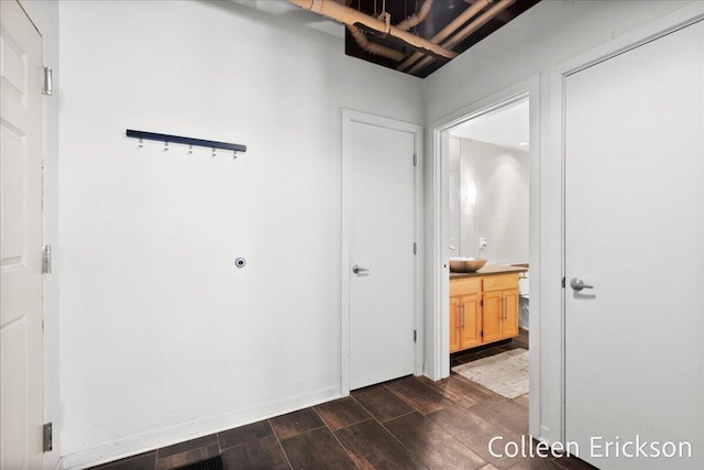600 Monroe Ave NW Unit 409, Grand Rapids, MI 49503 - corridor featuring dark wood-style flooring
