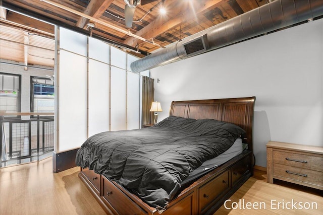 600 Monroe Ave NW Unit 409, Grand Rapids, MI 49503 - bedroom featuring light wood finished floors and wooden ceiling
