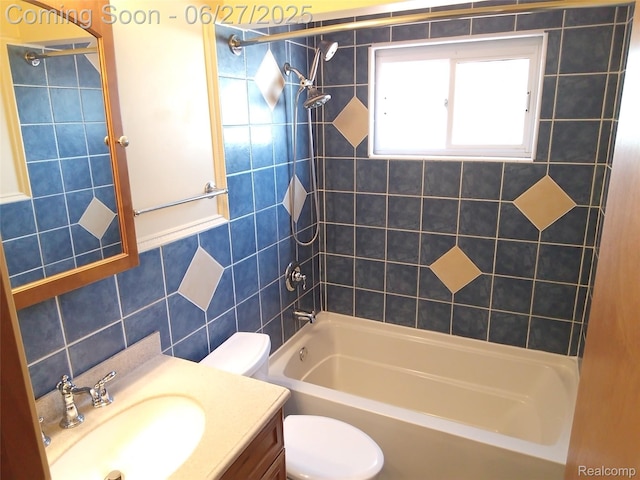 8283 Christine St, Warren, MI 48093 - bathroom featuring shower / tub combination, tile walls, and vanity