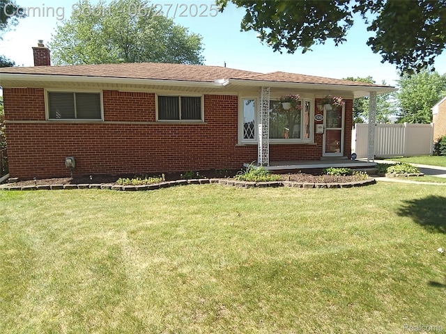 8283 Christine St, Warren, MI 48093 - view of front of house featuring brick siding, a chimney, and a porch