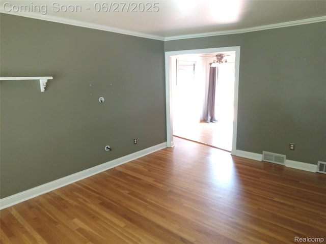 8283 Christine St, Warren, MI 48093 - empty room featuring ornamental molding and wood finished floors