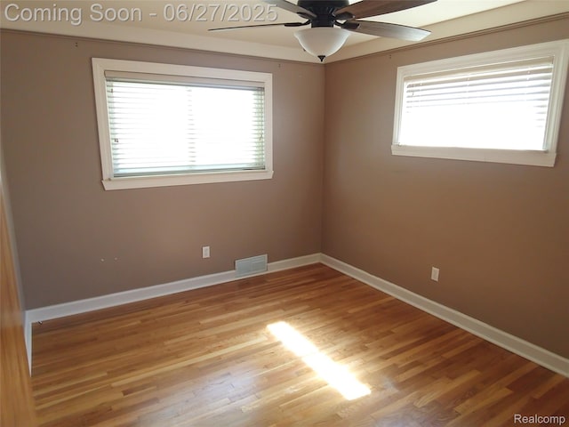 8283 Christine St, Warren, MI 48093 - unfurnished room featuring healthy amount of natural light, a ceiling fan, and light wood-type flooring