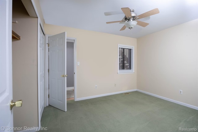 1660 River Rd Unit 7, Marysville, MI 48040 - unfurnished bedroom featuring carpet flooring and a ceiling fan