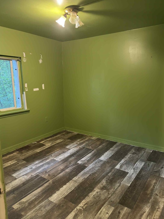 57993 Oak Park Rd, Three Rivers, MI 49093 - spare room with dark wood finished floors and ceiling fan