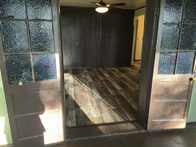 57993 Oak Park Rd, Three Rivers, MI 49093 - unfurnished room featuring ceiling fan, wood finished floors, and wood walls