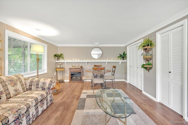 4155 Mill Lake Rd, Lake Orion, MI 48360 - living area featuring wood finished floors and ornamental molding
