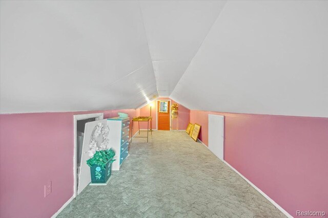 4155 Mill Lake Rd, Lake Orion, MI 48360 - additional living space with lofted ceiling and carpet floors