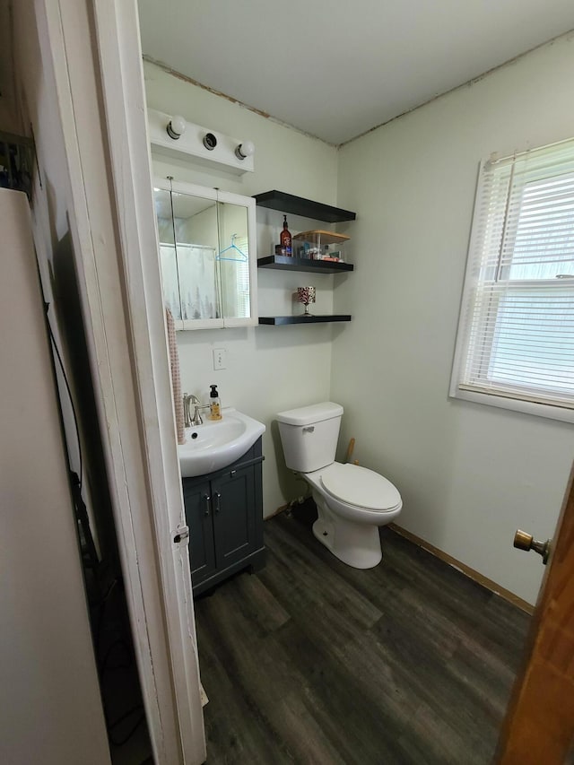 901 Helena Ave, Jackson, MI 49203 - bathroom with vanity and wood finished floors