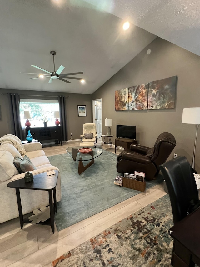5437 Grand River Dr NE, Grand Rapids, MI 49525 - living area featuring a ceiling fan, vaulted ceiling, recessed lighting, and wood finished floors