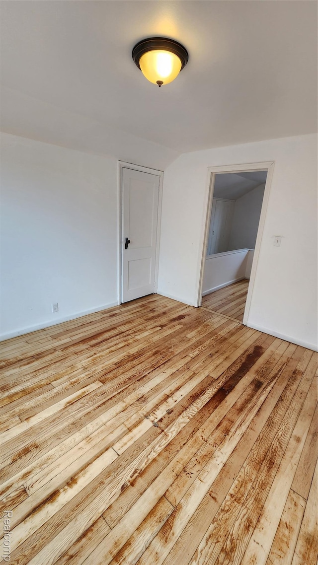 10947 Roxbury St, Detroit, MI 48224 - spare room featuring light wood-type flooring and baseboards