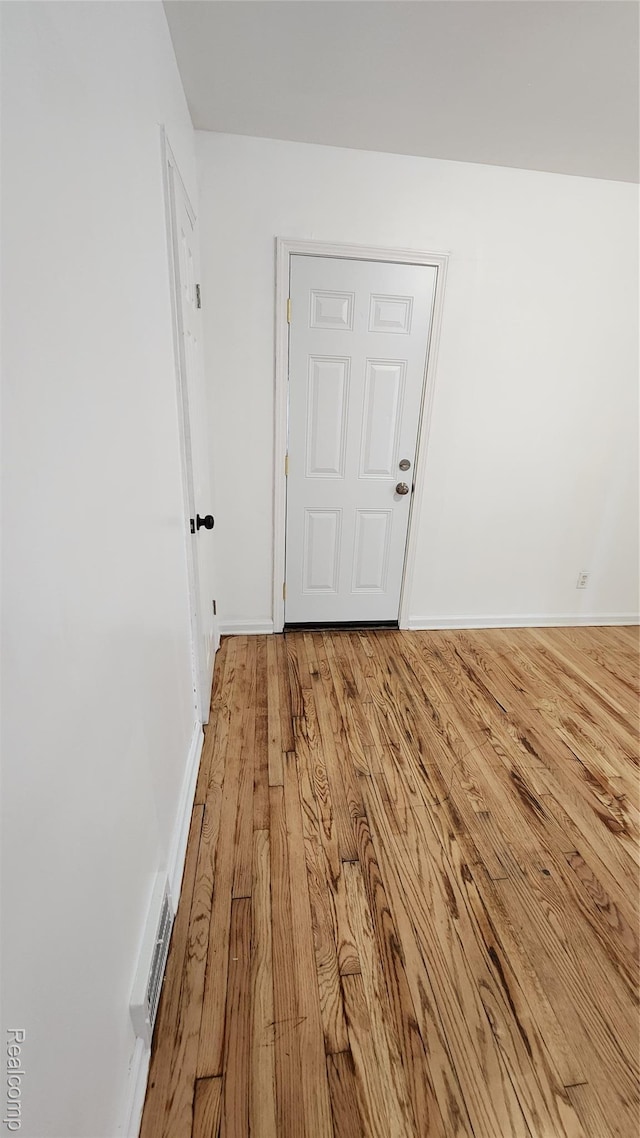 10947 Roxbury St, Detroit, MI 48224 - spare room featuring light wood finished floors and baseboards
