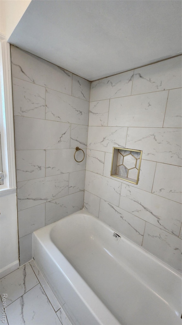 10947 Roxbury St, Detroit, MI 48224 - full bathroom featuring marble look tile flooring and a bathtub