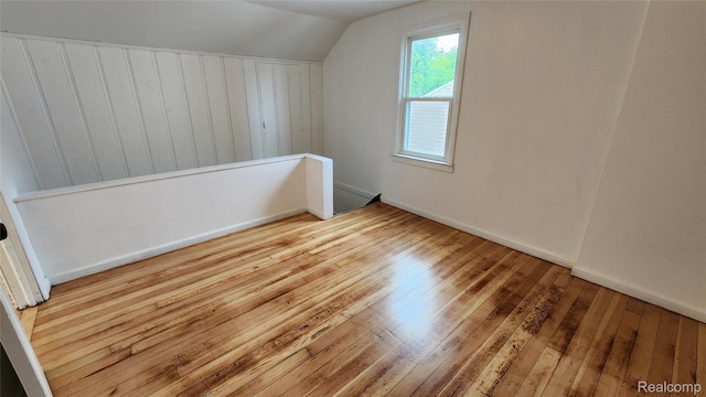 10947 Roxbury St, Detroit, MI 48224 - additional living space with lofted ceiling and hardwood / wood-style flooring
