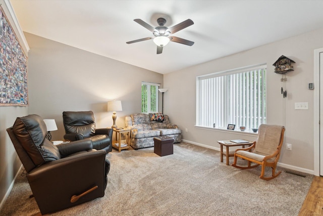 9422 Timber Ridge Dr, Grand Blanc, MI 48439 - living area featuring a ceiling fan and baseboards