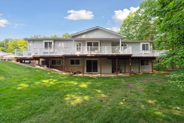 9422 Timber Ridge Dr, Grand Blanc, MI 48439 - rear view of house featuring a deck and a yard