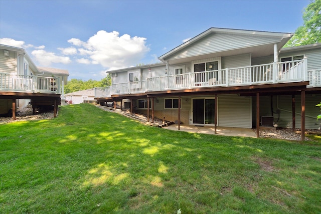 9422 Timber Ridge Dr, Grand Blanc, MI 48439 - rear view of property with a patio, a deck, and a yard