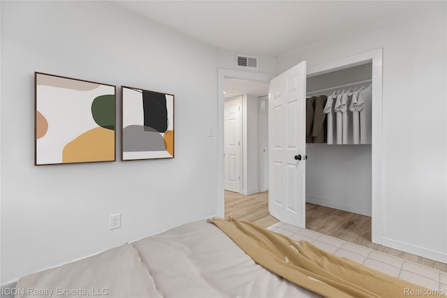 20628 Alger St, Saint Clair Shores, MI 48080 - unfurnished bedroom featuring wood finished floors
