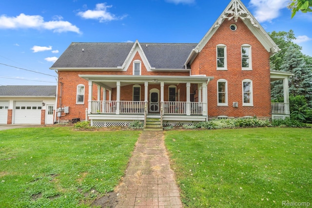 1666 Capac Rd, Berlin, MI 48002 - view of front facade featuring covered porch, brick siding, and a front yard